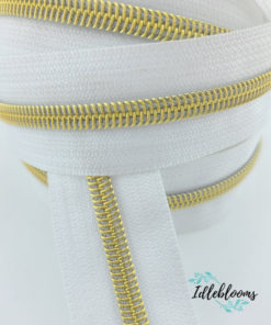 White with gold coil